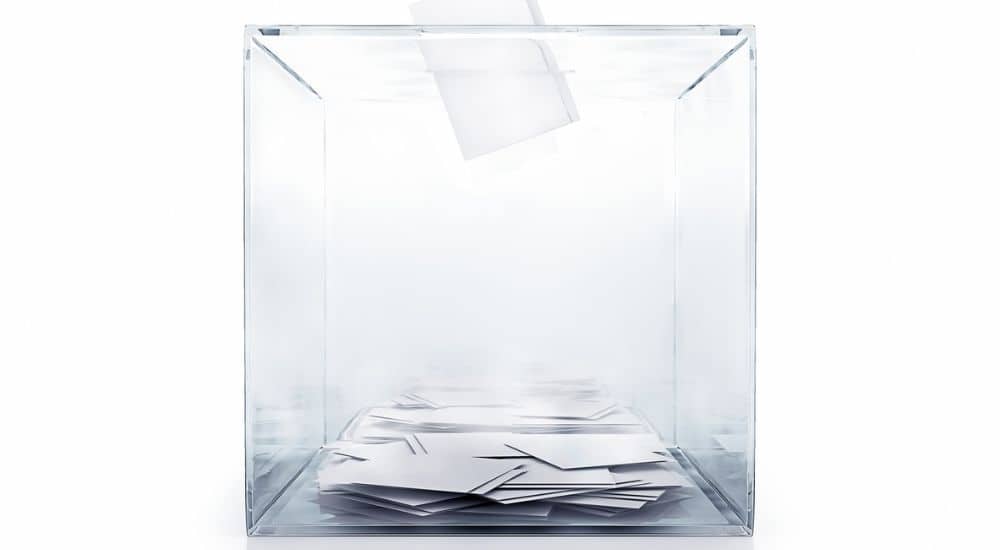 Urne de vote, Aide aux soins dentaires à Genève